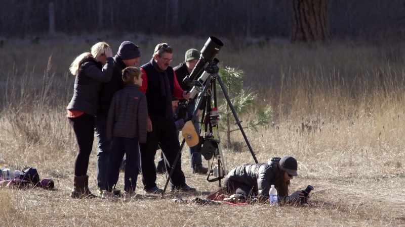 You can get a telescope or a pair of binoculars