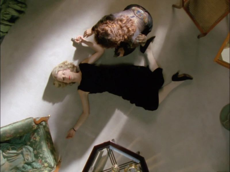 You take the pistol from her left hand