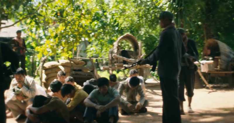 [young rebel speaking Khmer]