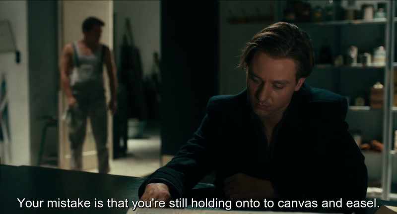Your mistake is that you are still holding on to the canvas and easel