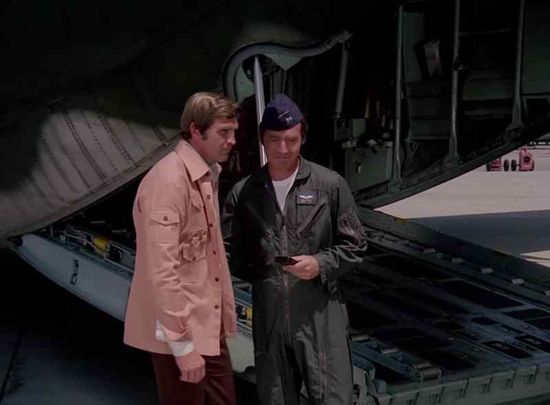Your staff car is over behind that hangar